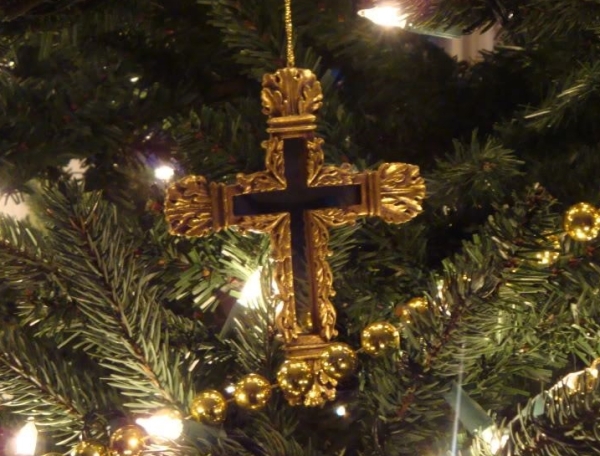cross-christmas-ornament-on-tree